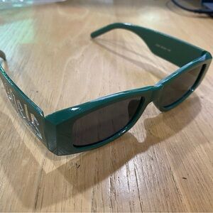 Green Sunglasses with Silver Logo